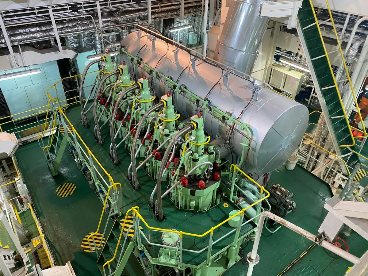 Large marine engine installed within a ship machinery space